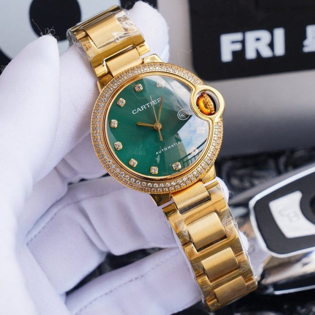 BALLON BLEU 33MM GOLD GREEN DIAL DIAMOND NUMERALS