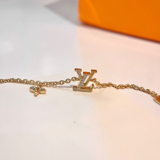 LV LOGO STAR MOTIF GOLD BRACELET