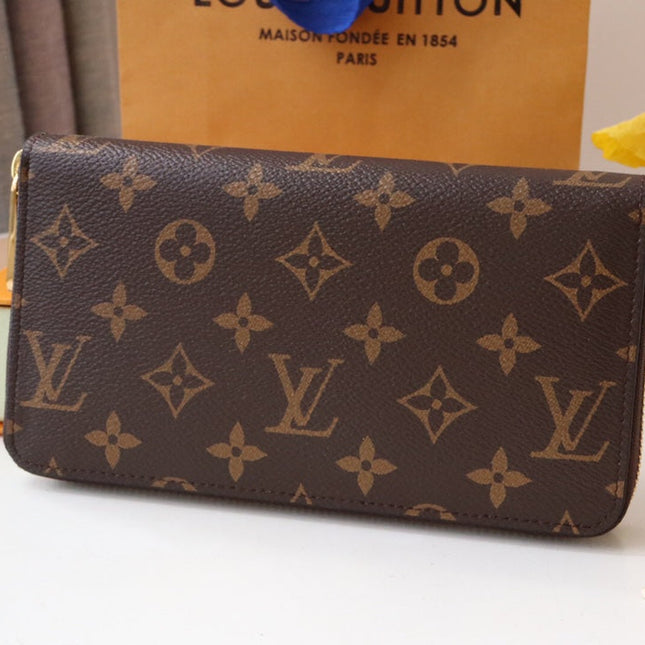 VIVIENNE ZIPPY WALLET 9.5 MONOGRAM CANVAS