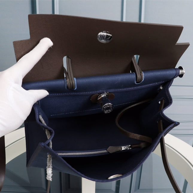 HM HERBAG ZIP 31 NAVY AND CHOCOLATE CANVAS