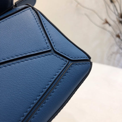 LOE MINI 18 PUZZLE BAG IN NAVY BLUE CALFSKIN