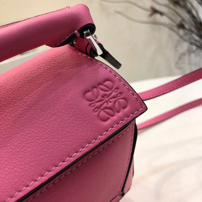 LOE MINI 18 PUZZLE BAG IN DEEP PINK CALFSKIN