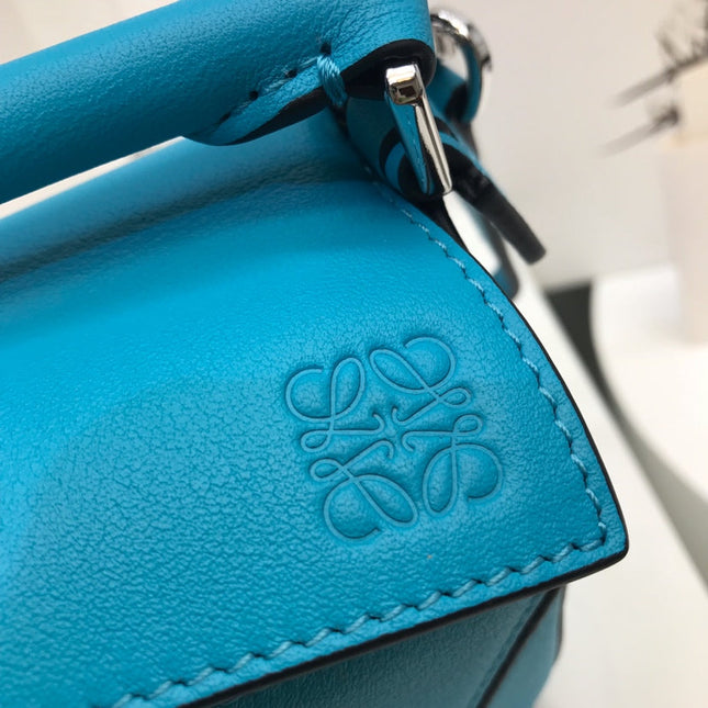 LOE MINI 18 PUZZLE BAG IN BLUE GREEN CALFSKIN