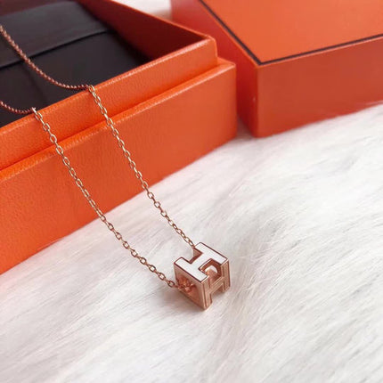 H WHITE SQUARE PINK GOLD NECKLACE