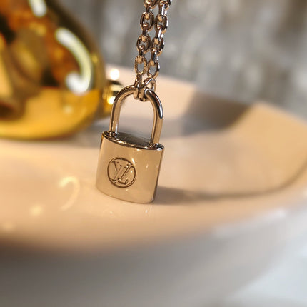 LV CHARITY LOCK NECKLACE