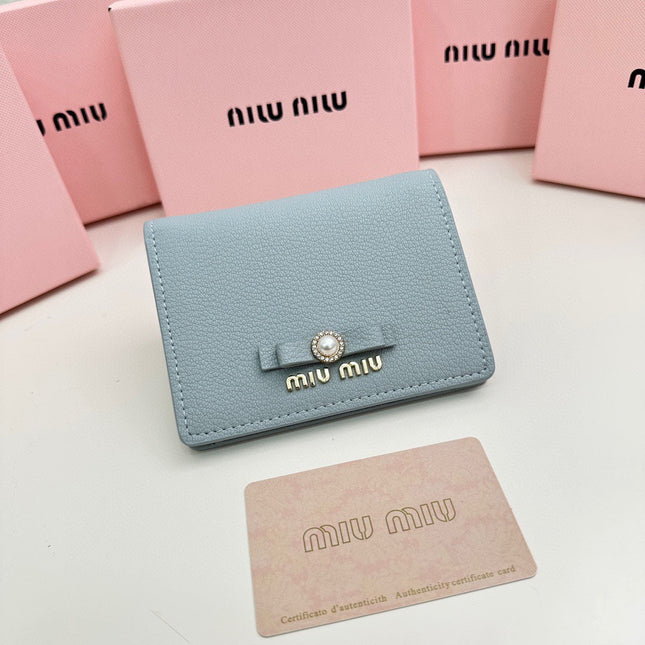 SMALL WALLET 11 IN BLUE PASTEL CALFSKIN